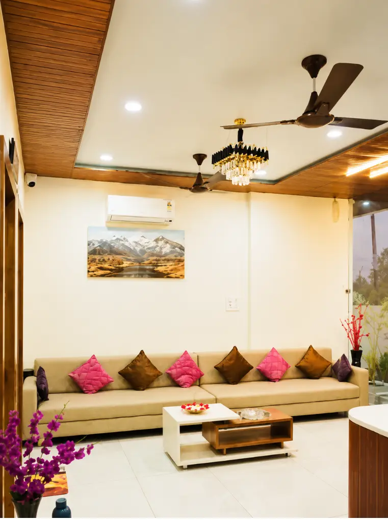 Seating area with sofa and colourful cushions